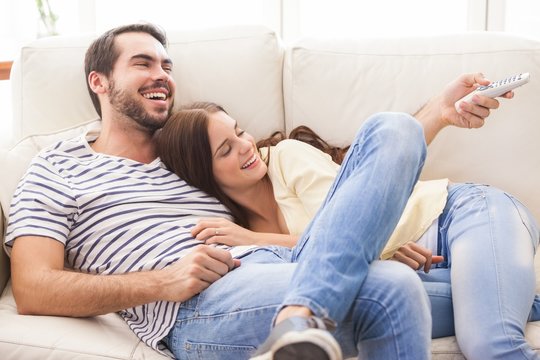 Cute Couple Relaxing On Couch