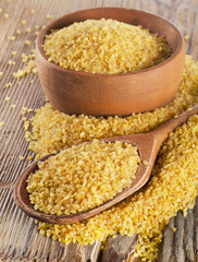 Bulgur in a wooden bowl.