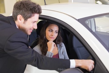 Businessman showing something to his customer