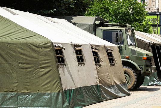 Military tent and truck