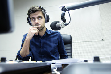 Radio presenter hosts the evening show on air