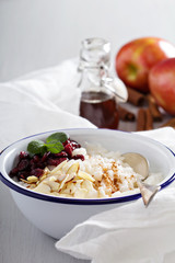 Breakfast rice porridge with almonds and cranberry