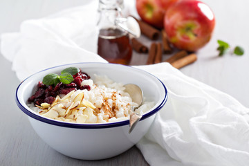 Breakfast rice porridge with almonds and cranberry