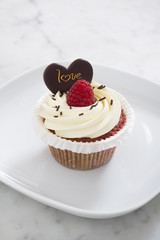 cup cake with raspberry