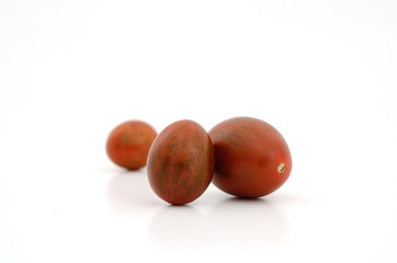 Chocolate Tomato or Brown color tomato isolate on white backgrou