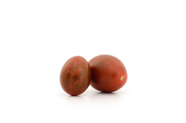 Chocolate Tomato or Brown color tomato isolate on white backgrou