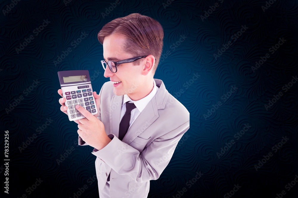 Poster Composite image of geeky smiling businessman showing calculator