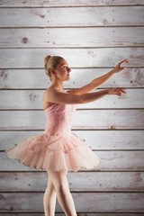 Composite image of pretty ballerina in pink © WavebreakmediaMicro