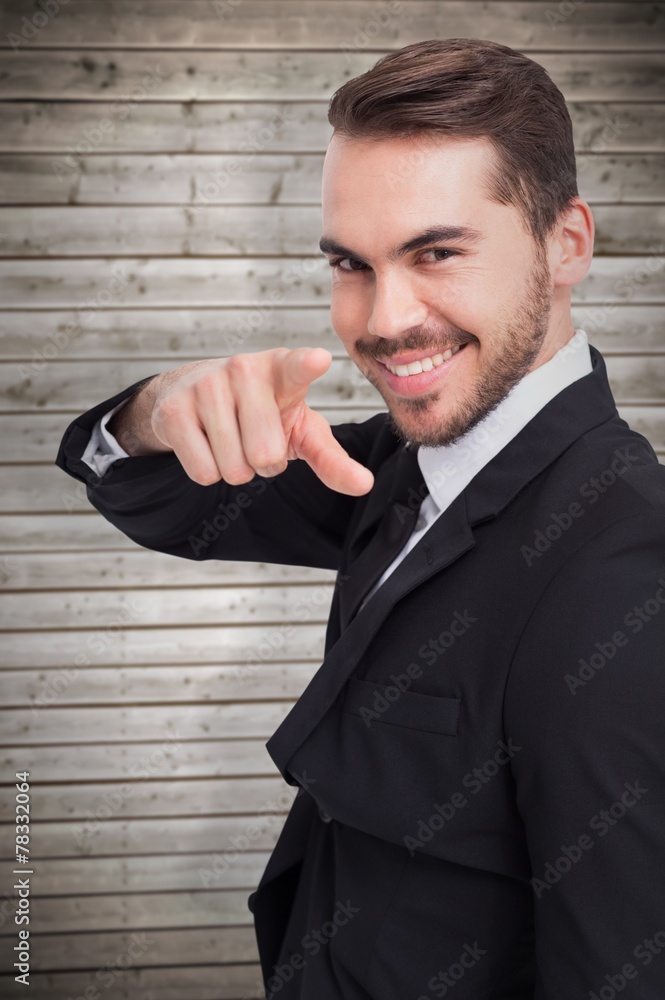 Poster composite image of happy businessman pointing his finger