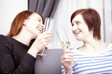 two young girls with champagne