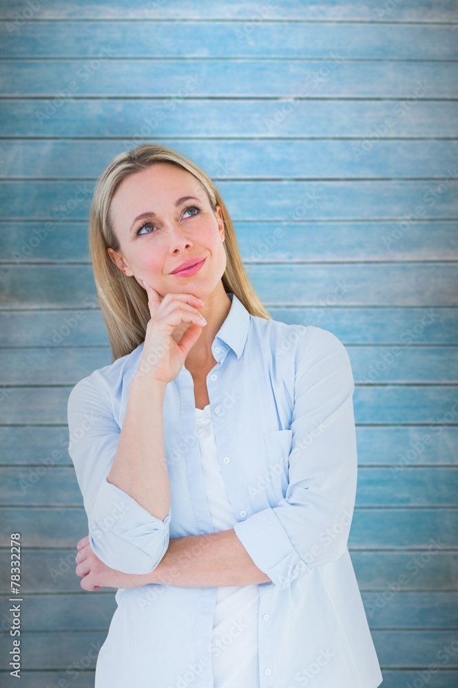 Poster composite image of smiling blonde thinking with hand on chin