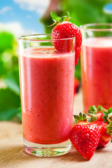 Summer drink, strawberry smoothies, outdoor