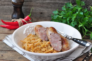juicy Roasted Bavarian sausages with the stewed cabbage