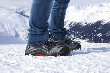 Safety shoes in the snowy mountains