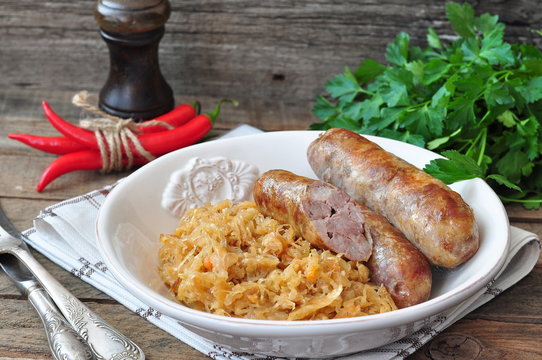 juicy Roasted Bavarian sausages with the stewed cabbage
