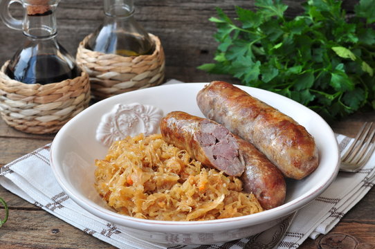juicy Roasted Bavarian sausages with the stewed cabbage