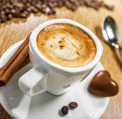 Cup of coffee with candy heart, love symbol