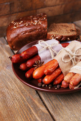 Assortment of thin sausages, and spices