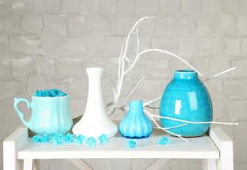 Interior with decorative vases and branch twig