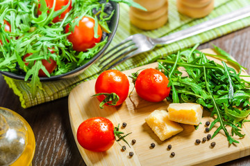 Tomato rucola and Parmesan salad cooking