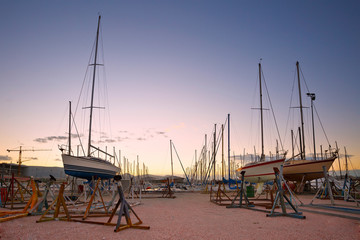 Dry docked sail boats in Kallithea marina, Athens, Greece.