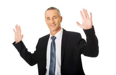 Businessman pressing abstract screen