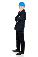 Confident businessman with folded arms