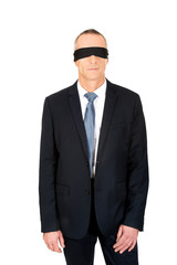 Businessman with band on eyes
