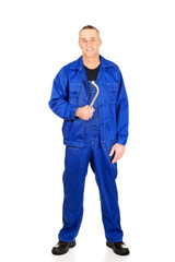 Fototapeta premium Repairman holding his wrench