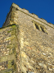 flint and brick church tower 11th century