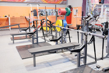 Obraz premium Weight lifting equipments in a club gym