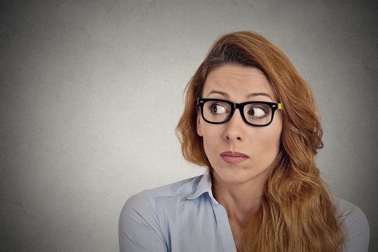 Headshot worried anxious office worker with glasses 