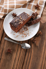 chocolate cake  in a bowl on a wooden boards background