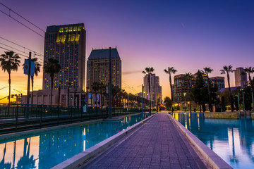 Skyscrapers and the Children's Pond at sunset, in San Diego, Cal - obrazy, fototapety, plakaty