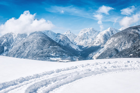 Winter landscape with snow covered mountains