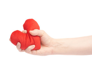 Squeezing a red heart with a hand