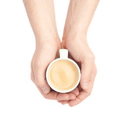 Holding a cup of coffee with two hands