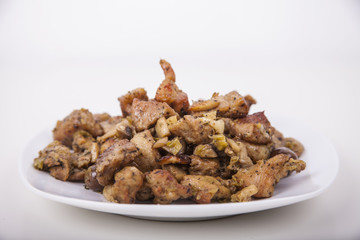 Baked pork meat with myshrooms and leeks