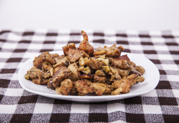 Baked pork meat with myshrooms and leeks