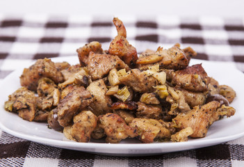 Baked pork meat with myshrooms and leeks