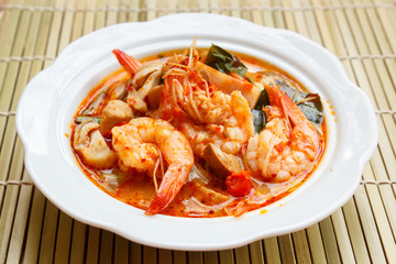 Tom Yum Goong, spicy soup with shrimp.