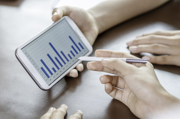 women using tablet with stylus pen