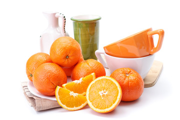 Oranges on white plate