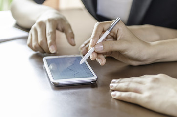 women using tablet with stylus pen