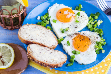 Valentines delicious breakfast fried eggs hearts