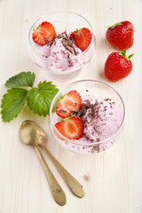ice cream with fresh strawberries & grated chocolate in glass