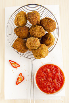 italian fried appetizer snack. eggplant meatballs with spicy tom