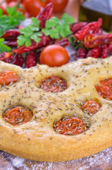 Traditional italian focaccia with cherry tomatoes