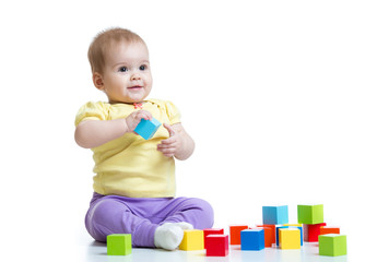 child boy playing wooden toys
