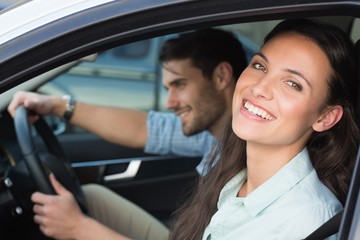 Young couple smiling at the camera